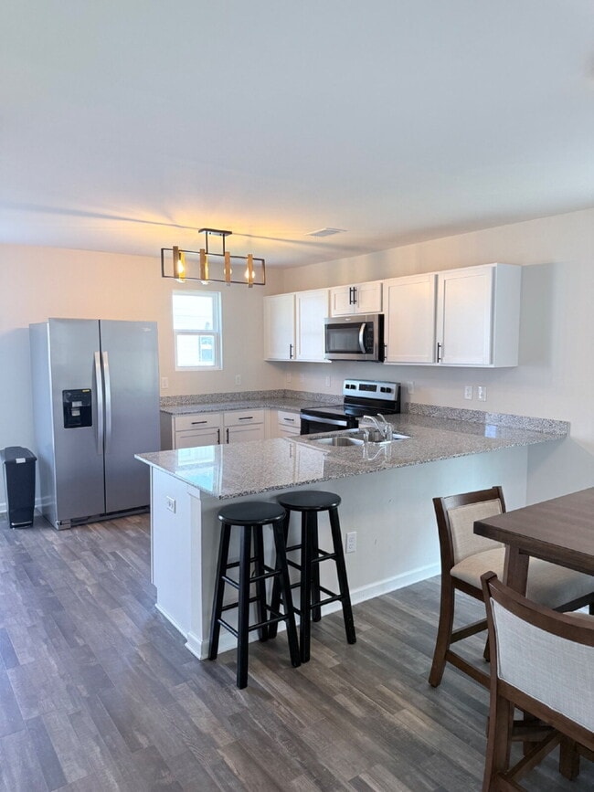 Foto del edificio - "Charming Coastal Retreat: 3-Bedroom on Island Breeze Lane!" **Limited-time offer: First month FR...