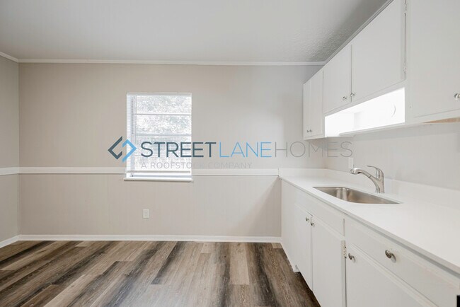 Building Photo - NOW OFFERING HALF OFF THE FIRST FULL MONTH...