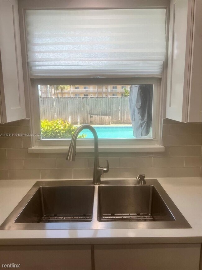 Foto del edificio - 3 br, 2 bath House - 1410 NE 56th Ct # 1412