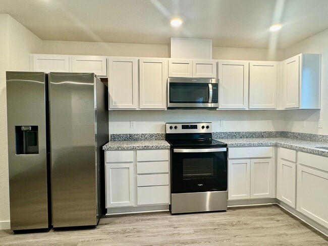 Building Photo - BRAND NEW 4 BEDROOM, 2.5 BATHS, 2 CAR GARA...