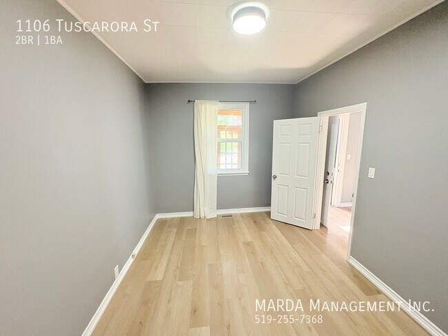 Photo du bâtiment - CHARMING 2 BED/1 BATH BUNGALOW - CORNER LO...