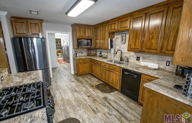 Building Photo - 24054 Joe May Rd