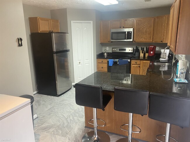 Building Photo - 1 br, 1.5 bath Townhome - 2816 Berrywood L...