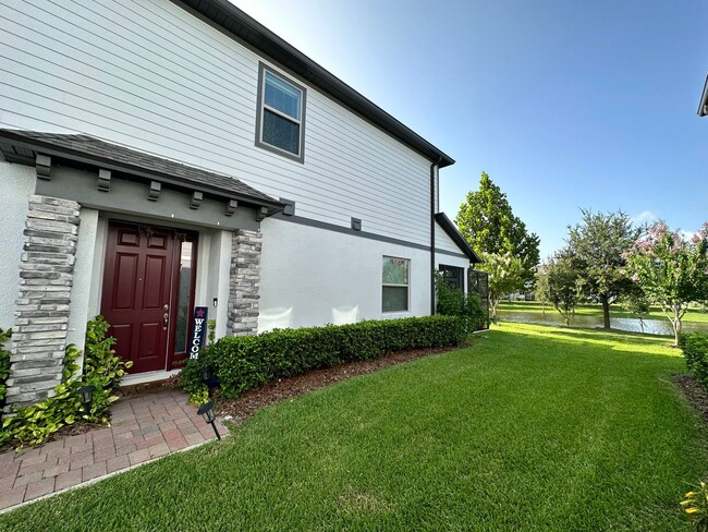 Photo - Lease this 3BR End-Unit Townhome in Gated Community with Water View!