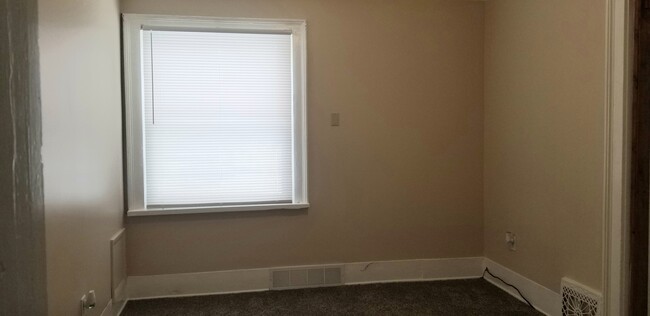 Bedroom #2 - new windows and carpet - 210 S Concord St