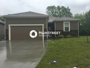 Building Photo - 213 NE Kim Ct
