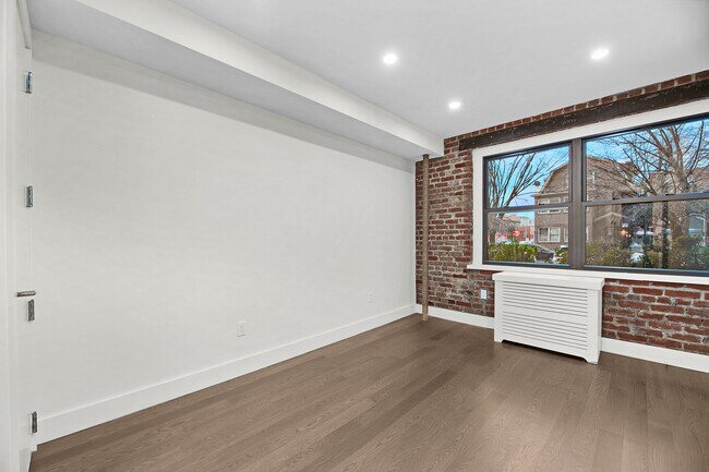 Building Photo - 37-55-55 77th St