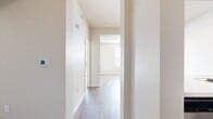 This contemporary 1-bedroom apartment in Rancho Cucamonga offers 650 square feet of efficiently designed living space. The open floor plan creates a seamless flow between the living areas, enhancing the sense of spaciousness. The kitchen is a standout feature, boasting modern cabinetry, quartz countertops, and stainless steel appliances, including a gas range and over-the-range microwave.

The living room is bathed in natural light thanks to large windows and a sliding glass door leading to an outdoor space. A ceiling fan adds both style and functionality. The bedroom, measuring 130 square feet, also benefits from ample natural light and includes a ceiling fan for comfort.

The bathroom showcases a modern vanity with ample storage and a sleek design. Throughout the apartment, wood-look flooring adds warmth and durability. A notable convenience is the in-unit laundry area, equipped with full-sized Whirlpool washer and dryer.

The apartment's neutral color palette and clean lines create a contemporary ambiance, offering a blank canvas for personal styling. With its thoughtful layout and modern amenities, this apartment presents an attractive option for those seeking a stylish and functional living space in Rancho Cucamonga.