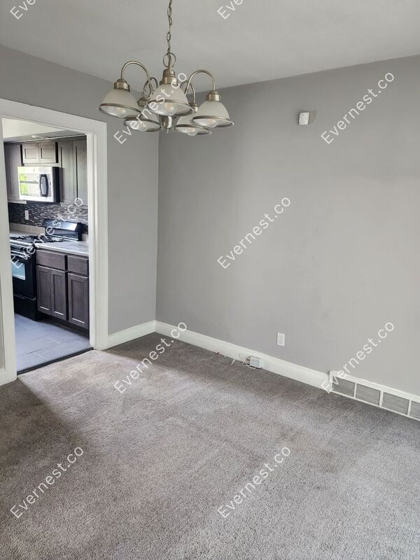 Building Photo - 6942 Raymond Ave