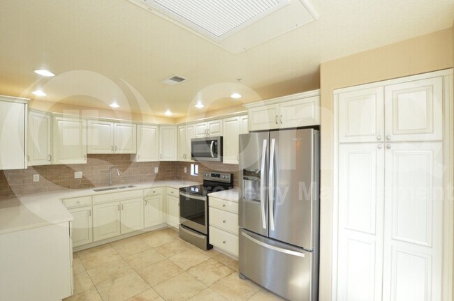 Building Photo - 9455 E Raintree Dr