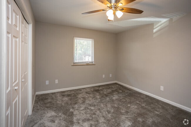 2BR, 1BA - 900SF - Primary Bedroom - The Village Apartments