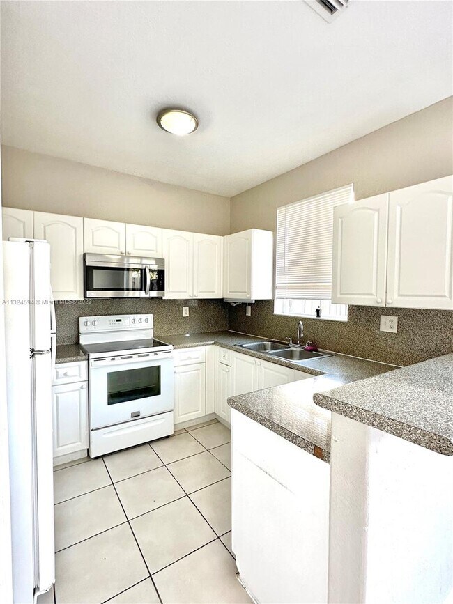 Building Photo - 7301 NW 174th Ter