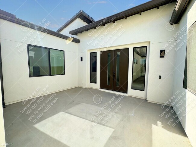 Foto del edificio - 5 br, 3.5 bath House - 9512 S S 13th Pl