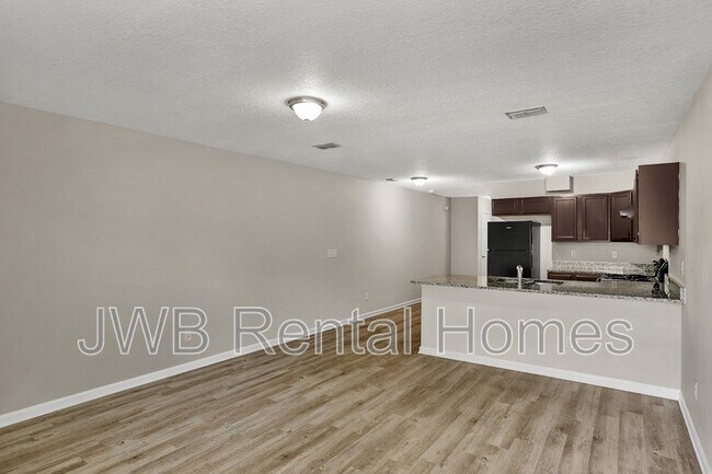 Building Photo - 8480 McGirts Village Ln