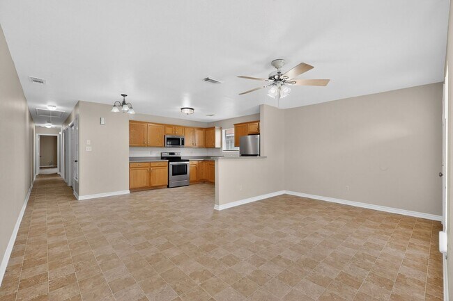 Building Photo - Open-Concept Living with Private Backyard Retreat in a Move-In Ready 3 Bedroom Home