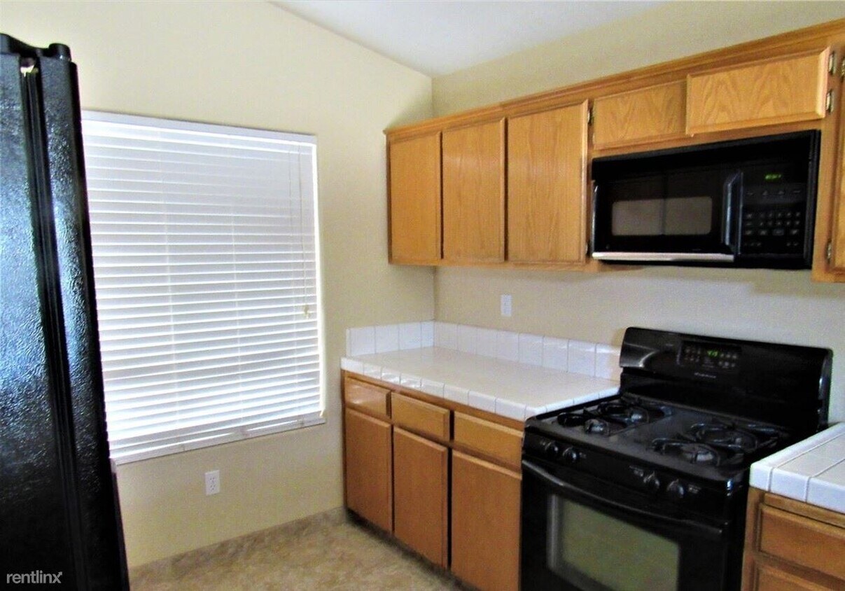 Building Photo - 3 br, 2 bath House - 8800 Penticton Ct