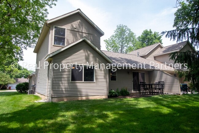Building Photo - Spacious 3BR Townhome in Lowell | Nature Views & Maintenance-Free Living