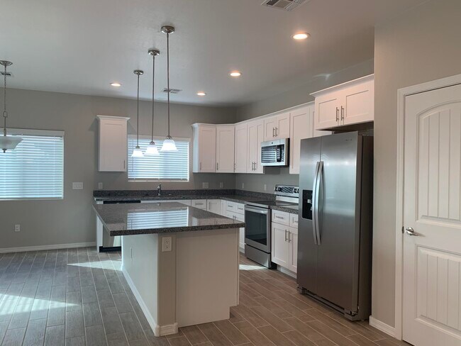 Building Photo - 9793 W Camelia Dr