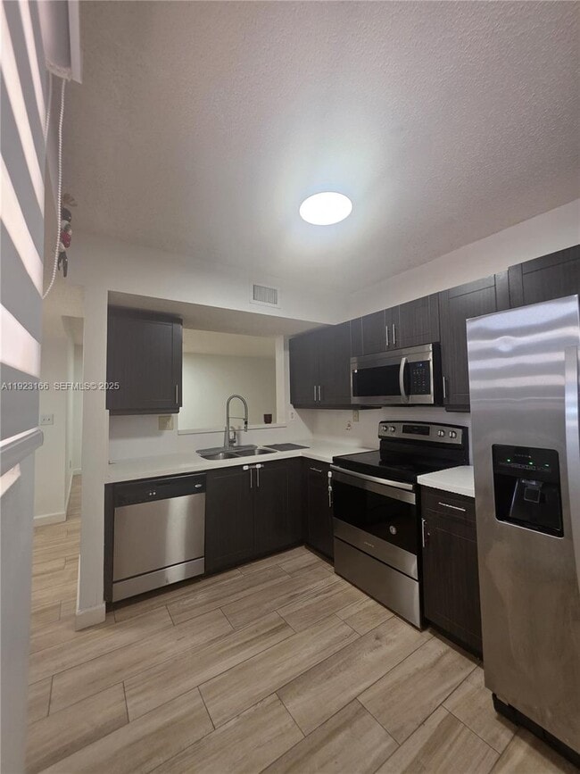 Building Photo - 15711 SW 137th Ave