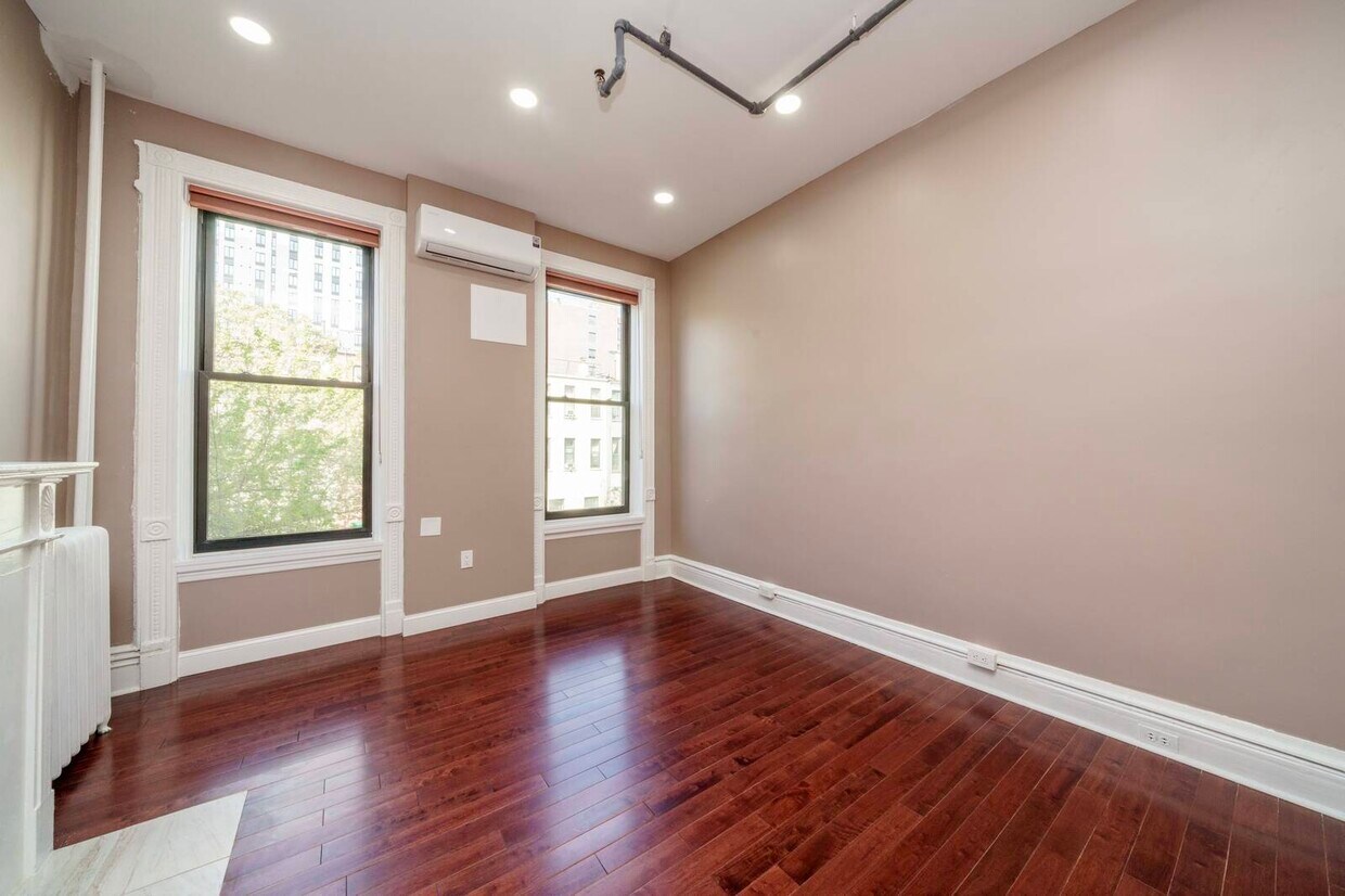 Foto del edificio - 211 W 122nd St