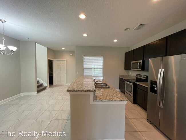 Foto del edificio - 3 br, 2.5 bath House - 8452 Magnificent Lane