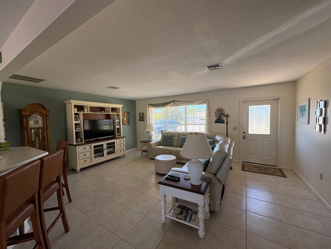 Building Photo - Sunsets & Serenity 2/2 Pool Home on a canal