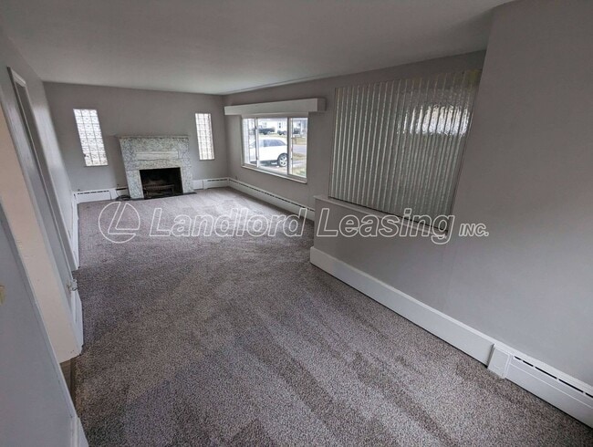 Building Photo - Spacious 3-Bedroom Home with 2-Car Garage ...