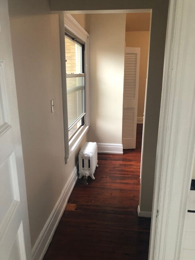 Building Photo - Studio Available! All utilities included!