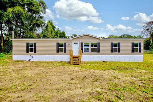 Building Photo - 8595 NW 13th Ct
