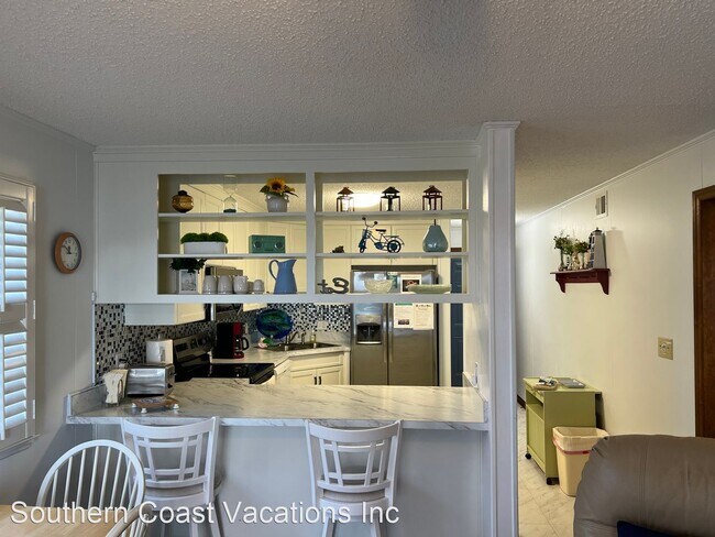 Building Photo - 2 br, 2 bath House - 5709 N. Ocean Blvd Un...