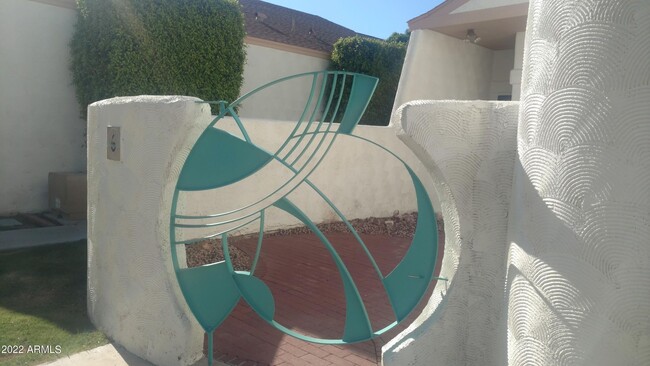 4. Iconic Gate Design - 33 W Missouri Ave
