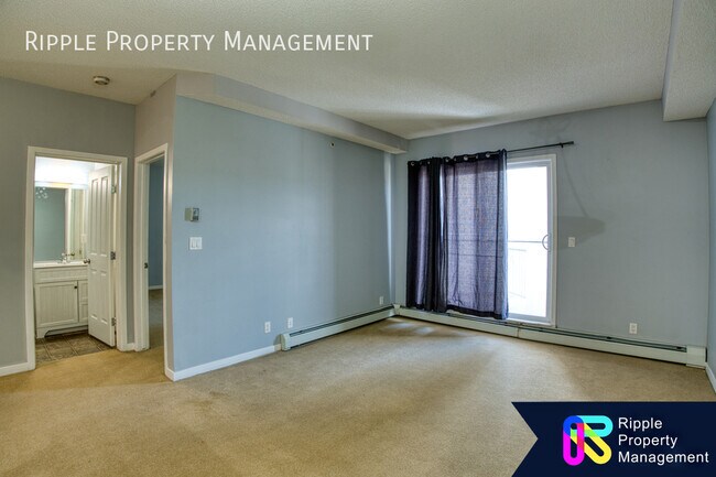 Photo du bâtiment - GORGEOUS 1 BED+DEN/ 1 BATHS CONDO