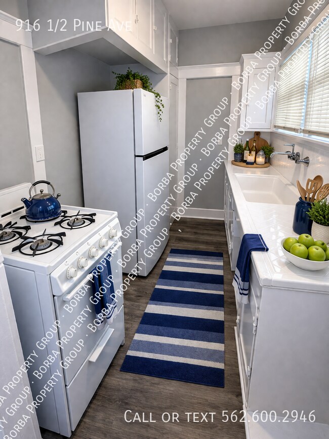 Foto del edificio - 916 1/2 Pine Ave-