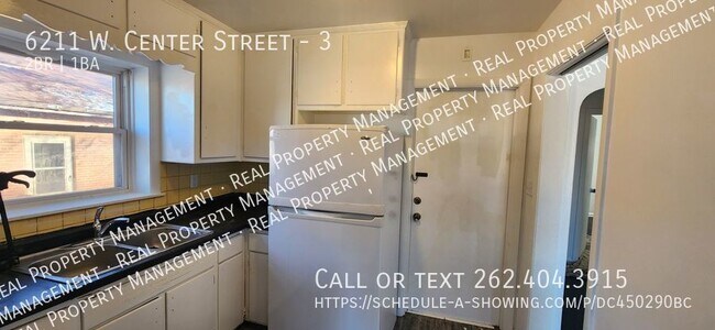 Building Photo - Two Bedroom upper unit