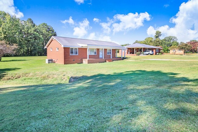 Building Photo - Spacious BRICK RANCH on large lot *GREAT G...