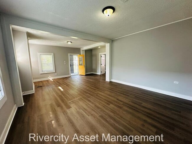 Building Photo - Move-In Ready! Stunning 4-Bedroom, 2-Bath Renovation with Porch & Big Yard. Section 8 Friendly.