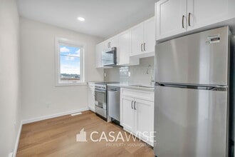 Building Photo - 21039-21025 25 Ave NW