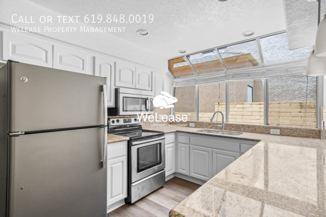 Building Photo - Spacious 3-Bedroom Townhome with Balcony J...