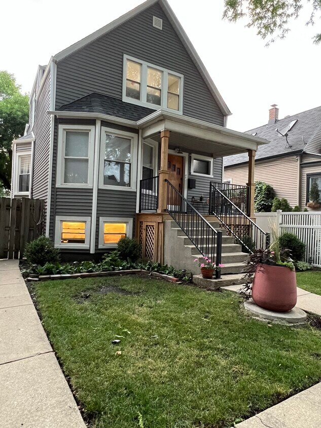 Top floor of two-story house - 4108 N Lawndale Ave