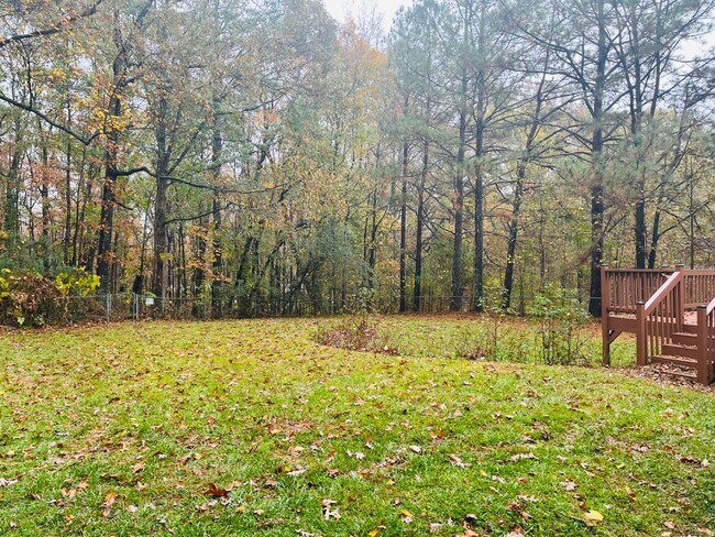 Building Photo - Wow! Finished basement, large deck, LVP fl...