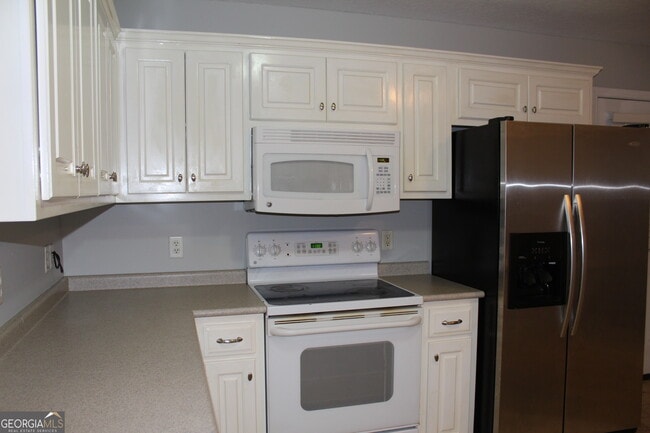 Building Photo - 8052 Burkhalter Rd