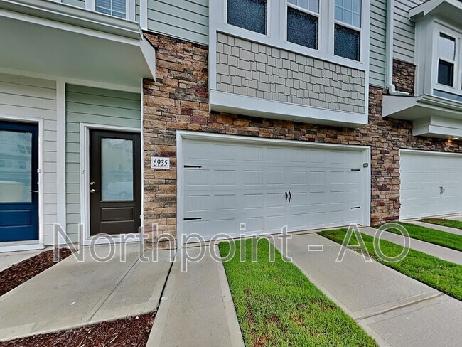 Foto del edificio - 6935 Woodland Stream Pl
