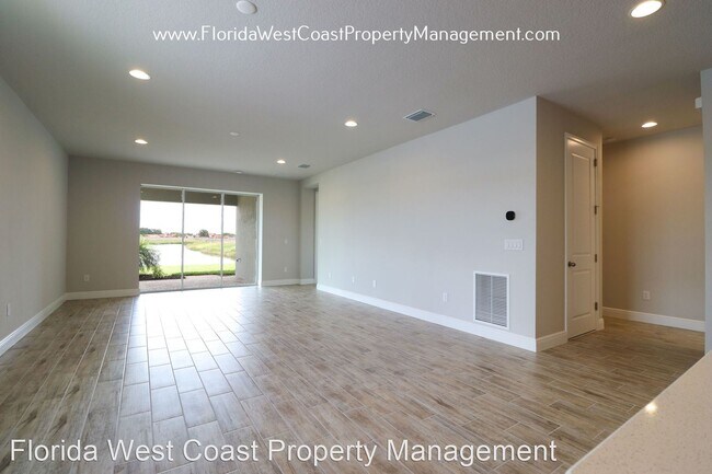 Building Photo - 4 br, 3 bath House - 5854 Long Shore Loop