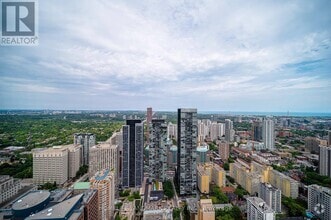 Building Photo - 50A-5150 Charles St E