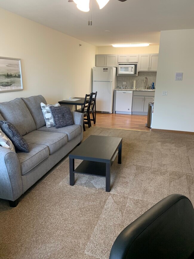 Living room looking towards kitchen - 131 E Park Ave