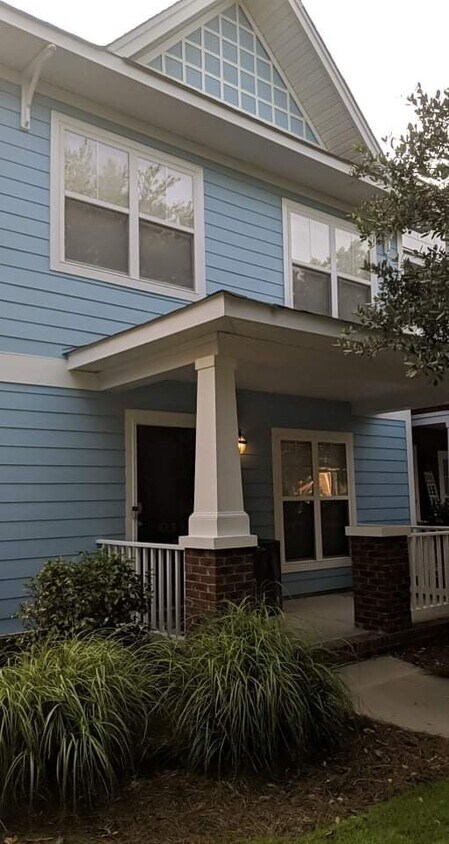 Beautiful new exterior paint in soft blue - 613 Lake Forest Road