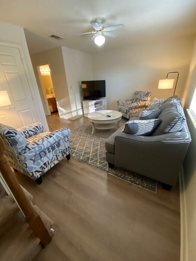 Den with cost closet and ceiling fan - 119 Michael Dr