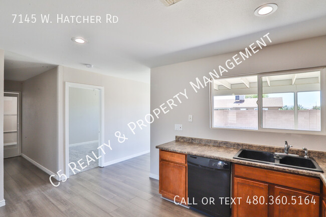 Building Photo - 7145 W Hatcher Rd