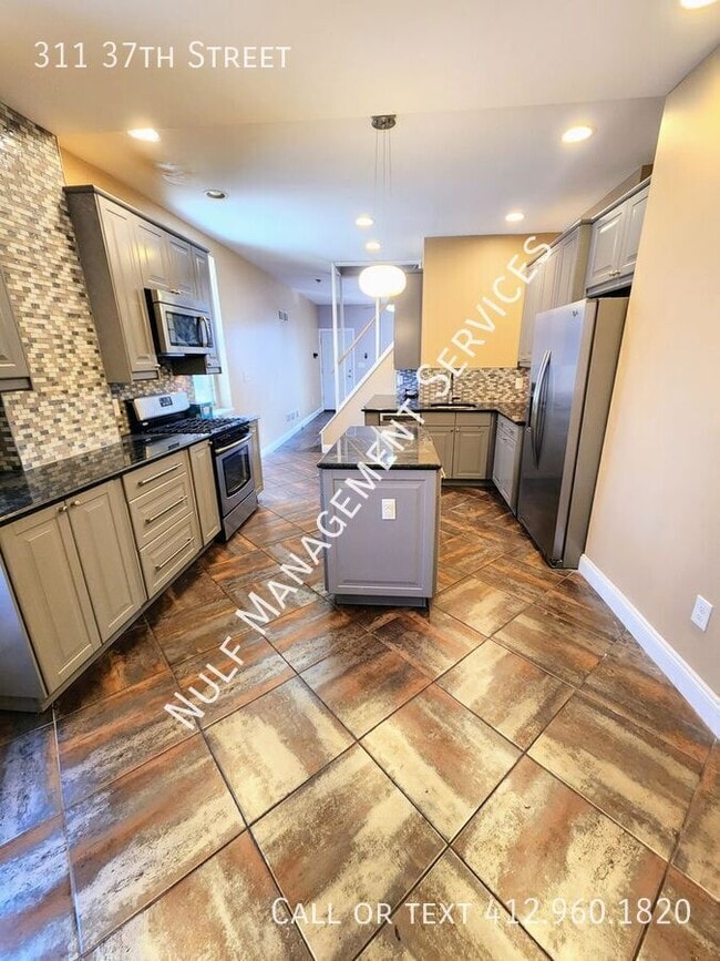 Photo - 311 37th Street- House