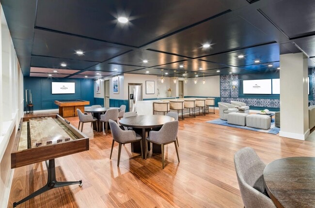 Unwind and play at Modera Waugh! Explore the fun in our stylish game room, complete with a pool table for your perfect break from the everyday. Elevate your leisure time in Houston! - Modera Waugh